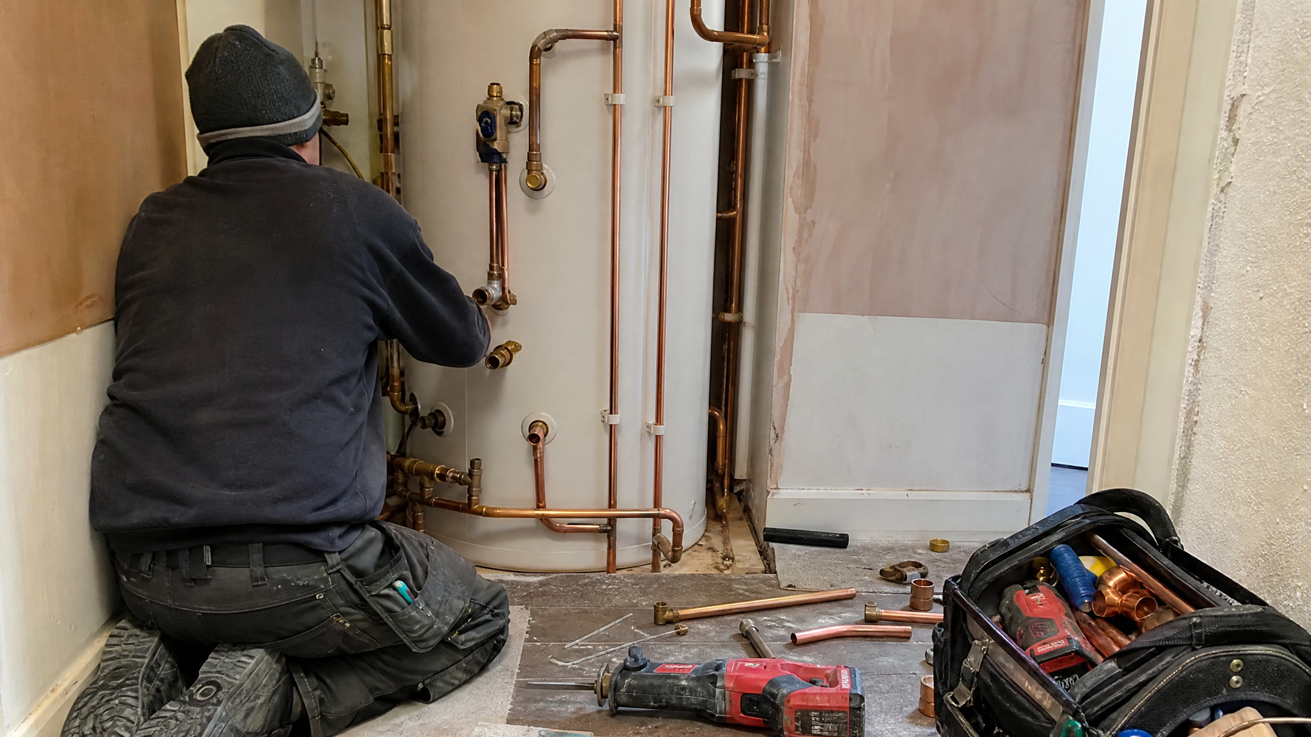 Hot Water Cylinder Installation in progress at a British residential property — professional service in Walsall